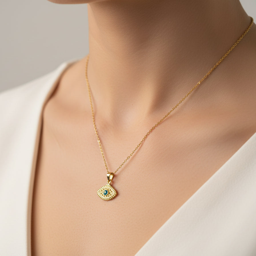 Collar de mal de ojo dorado