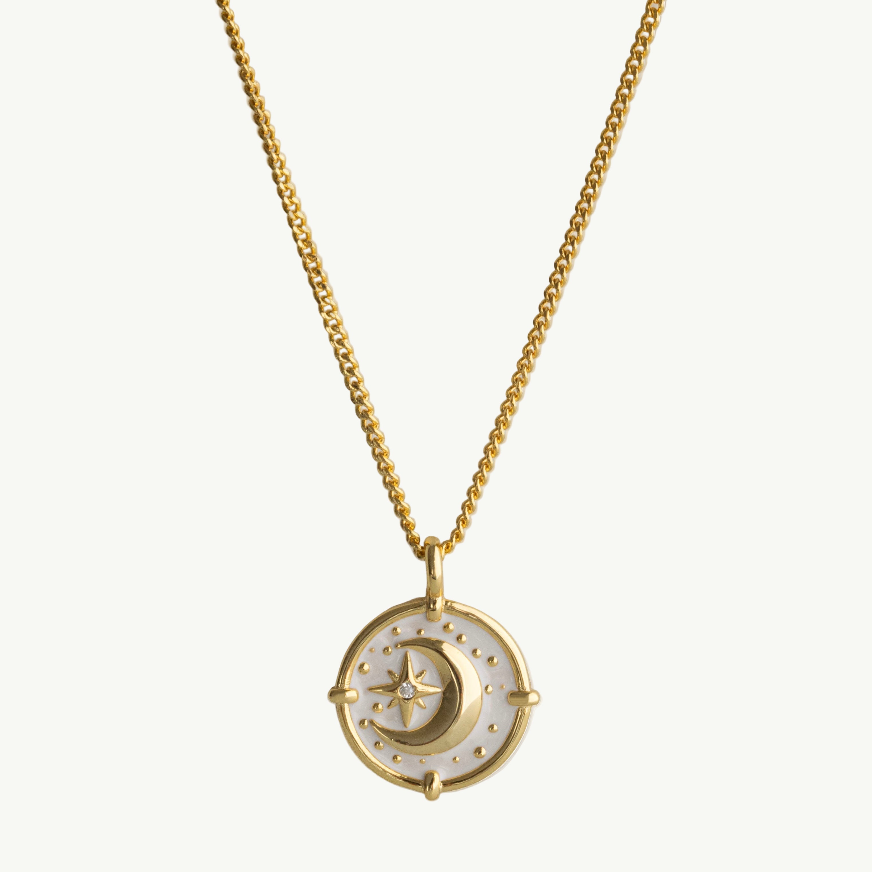 Collar con medallón de luna y estrella de oro