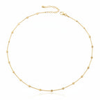 Gargantilla con disco dorado